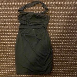 Black spandex cutout dress with choker. Zips in back.